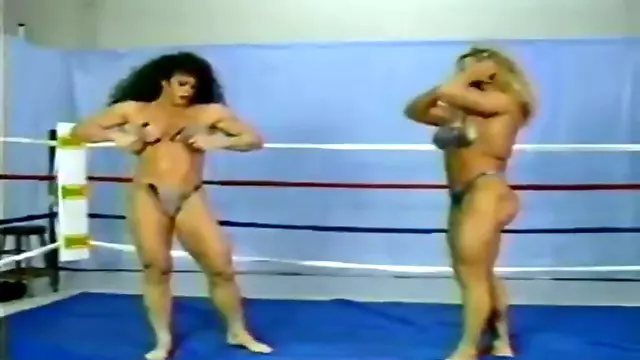 name the muscle wrestling/catfight video company 34