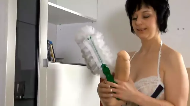German maid fucks massive dildo