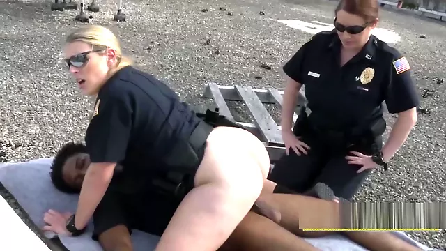 Horny milf cops arrest peeping tom on a rooftop for spying on women